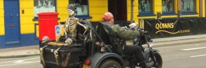 Skeleton man on bike