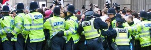 Police push into a crowd of protesters near Bank / image by chrisjohnbeckett from the Londonist Flickr pool