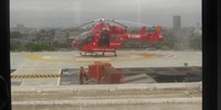 View of the London Air Ambulance from inside the helipad offices.