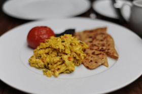 Bombay scrambled eggs with tawa paratha 