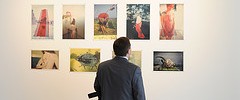 16076_4309313455_4344377ff5_m Photography of an admirer viewing Boris Mikhailov's works by Chris Osburn