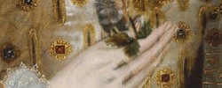 16522_snakeinhand Detail of the faded posy, showing a coiled serpent.