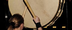 Photo of Kodo drummer announcing the opening of Tsuru's new Bishopsgate location by Chris Osburn