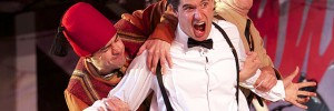 Josh Cohen (Dromio), Daniel Llewelyn-Williams (Antipholus) and Christopher Logan (Officer) get farcical in The Comedy of Errors at Regent's Park Open Air Theatre. Photo by Manuel Harlen