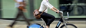 Woman riding Cycle Hire bike