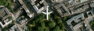 As many people have noticed, the photographs capture a plane over Russell Square.