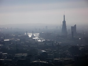 Looking south-east, the city smog enshrouds the Thames, and the ever-rising Shard.