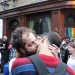 two men kissing outside the John Snow pub