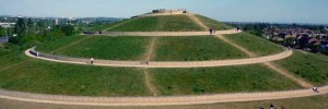 The biggest mound is encircled by a spiral pathway, marked by walls built of crushed concrete in steel cages