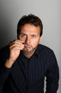 John Finnemore here, drawing a beard on himself