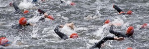 Triathletes swim in Royal Victoria Dock - image/Simon Kimber