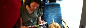 This man should be able to ditch his magazine for browsing the web on his laptop before the Olympics. As for the cat... speechless. Image by acb.