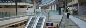 The main interior corridor curves round like a retail version of the Large Hadron Collider.