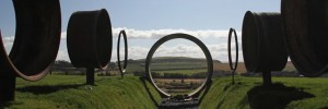 Charles Jencks: The Avenue of Doubles focuses through a sewer pipe on a volcano 375 million years old © Charles Jencks