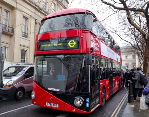 The bus arrives, with Transport for London commissioner Peter Hendy at the wheel