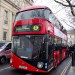 The bus arrives, with Transport for London commissioner Peter Hendy at the wheel