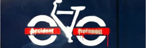 Stencil graffiti of TFL bike with 'accident hotspot' written on it