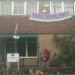 People Before Profit's Ray Woolford (and Digby) outside the occupied Angus Street property