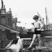 Back Garden Cabaret: Two young ballet dancers, Violet Hutchinson aged 8, and Betty Putt aged 7, rehearsing in a back garden in Poplar, east London. (Photo by Fox Photos/Getty Images)