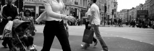 Striding out across Oxford Circus, by Pierre Mallien