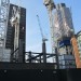 The Cheese Grater begins to rise. The stalled Pinnacle can be seen in the background.