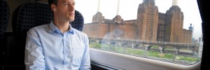 Customer listening to Express Tracks from Gatwick Express