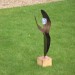 A ceramic tulip in Paul Cummins' flower garden outside Westminster Hall