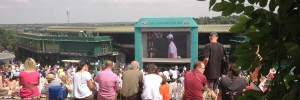 Spectators watching the big screen on Henman Hill / Murray's Mound