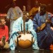 Damon Abarn on stage with Malian musicians Toumani Diabaté and Bassekou Kouyate, by Andy Buurman
