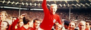 World Cup Final, 1966. Wembley, England. 30th July, 1966 England 4 v West Germany 2. Englands captain Bobby Moore holds aloft the Jules Rimet World Cup trophy as he sits on the shoulders of his teammates after the match.