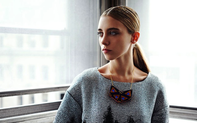 Dress by Jennifer Morris; necklace by Lili Colley