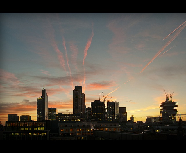 city-contrails-clouds