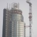 The low cloud briefly lifts to give a better view of the damage caused by the crane.