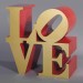 Robert Indiana (1928 -) Love (gold faces - red sides), 1966 - 2002. Image courtesy Opera Gallery.