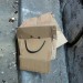 Even this abandoned cardboard box is happy, by David Crausby