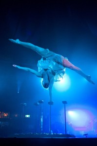 Contortionist Henna Kaikula balances over broken glass in circus show Cantina.