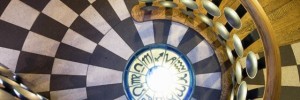 The main staircase with MC logo at the bottom.