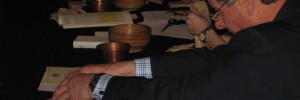 Coins are counted into a wooden bowl, with one coin from every sample placed in the copper bowl for further testing.