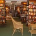 Even more travel books and a jaunty colonial-style wicker set in the basement