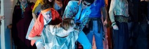 Liu is held back by the Elvis army