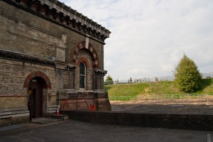 Outside Abbey Mills. The flat tarmac is the roof of the station's coal bunkers.