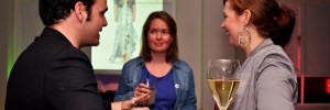 Lindsey hob nobs with gorgeous Londonist readers whilst a very tall glass of wine looks on.  Laura Babb
